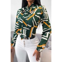 Elegant womens pussybow blouse with abstract pattern green